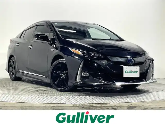 トヨタ プリウス ＰＨＶ A プレミアム 大阪府 2021(令3)年 2.3万km アティチュードブラックマイカ モデリスタエアロ　アルパインナビ　黒革シート　レーダークルコン　バックカメラ　ＥＴＣ　ドラレコ　シートヒーター／エアコン　ハンドルヒーター　ＢＳＭ　タイマー充電　ＨＵＤ　パワーシート　パークアシスト