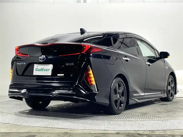 トヨタ プリウス ＰＨＶ A プレミアム 大阪府 2021(令3)年 2.3万km アティチュードブラックマイカ モデリスタエアロ　アルパインナビ　黒革シート　レーダークルコン　バックカメラ　ＥＴＣ　ドラレコ　シートヒーター／エアコン　ハンドルヒーター　ＢＳＭ　タイマー充電　ＨＵＤ　パワーシート　パークアシスト