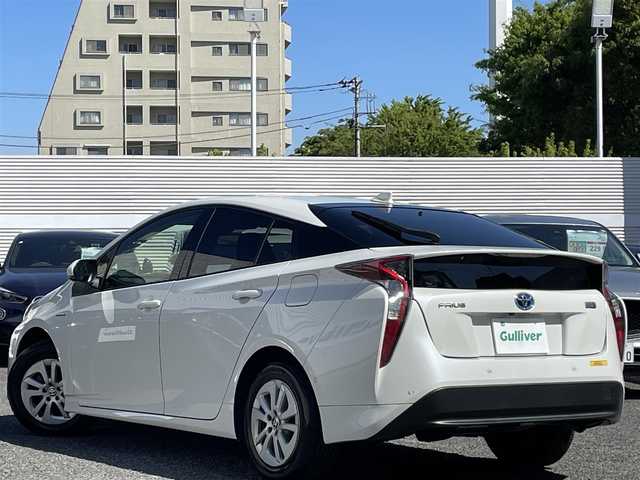 トヨタ プリウス Sセーフティプラス 東京都 2018(平30)年 2.4万km ホワイトパールクリスタルシャイン ワンオーナー/純正SDナビ/（フルセグ/BT/CD/DVD/FM/AM）/プリクラッシュセーフティ/アダプティブクルーズコントロール/レーンキープアシスト/オートマチックハイビーム/パーキングアシスト/バックカメラ/スマートキー/スペアキー/ドライブレコーダー（前後）/ETC2.0