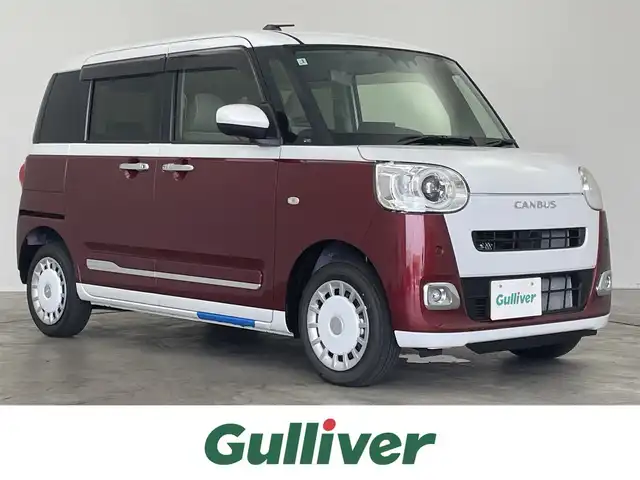 ダイハツ ムーヴ キャンバス ストライプス G 埼玉県 2025(令7)年 0.1千km シャイニングホワイトパール/ファイアークォーツレッドメタリック 4WD/届出済未使用車/純正9インチディスプレイオーディオ/ フルセグTV Bluetooth HDMI CarPlay/バックカメラ/スマートアシスト/衝突軽減ブレーキ/レーンキープアシスト/先行車発進お知らせ/ロードサインアシススト/誤発進抑制機能/コーナーセンサー /両側パワースライドドア/ドライブレコーダー/シートヒーター/置くだけ充電器/LEDオートライト/ETC