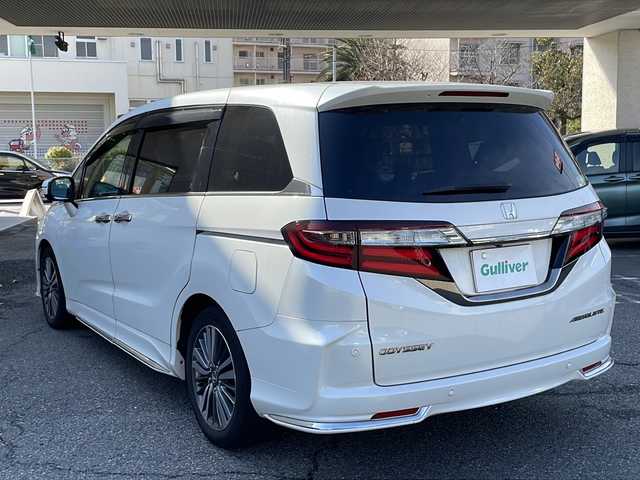 ホンダ オデッセイ アブソルート・EXホンダセンジング 兵庫県 2020(令2)年 4.3万km プラチナホワイトパール ワンオーナー/保証書・取説・有/純正メモリーナビ・フルセグ・BT・CD・DVD・FM・AM/バックカメラ/全周囲カメラ/ETC2.0/フリップダウンモニター/追尾機能付きクルーズコントロール/車線逸脱防止支援システム/衝突被害軽減ブレーキ/クリアランスソナー/両側パワースライドドア/パドルシフト/先行車発進通知/ブラインドスポットミラー/前後ドライブレコーダー/ロードサインアシスト/シートヒーター/アイドリングストップ/プッシュスタート/スマートキー×2/純正フロアマット/純正ドアバイザー