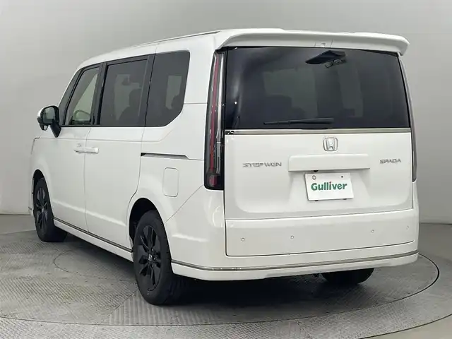 ホンダ ステップワゴン スパーダ 道央・札幌 2024(令6)年 2.4万km プラチナホワイトパール ・４WD/・社外メモリーナビ（AVIC-RZ314）/・BT/USB/ipod/AUX/・ステアリングリモコン/・バックカメラ/・ドライブレコーダー/・ETC/・ホンダセンシング/・衝突被害軽減ブレーキ/・レーンキープアシスト/・レーダークルーズコントロール/・ブラインドスポットインフォメーション/・オートブレーキホールド/・アイドリングストップ/・コーナーセンサー/・パドルシフト/・両側パワースライドドア/・パワーバックドア/・オートマチックハイビーム/・オートライト/・ヘッドランプレベライザー/・LEDヘッドライト/・ハーフレザーシート/・D+N席シートヒーター/・純正１６インチAW/・純正フロアマット/・プッシュスタート/・スマートキー/・スペアキー（１本）/・取扱説明書/・保証書