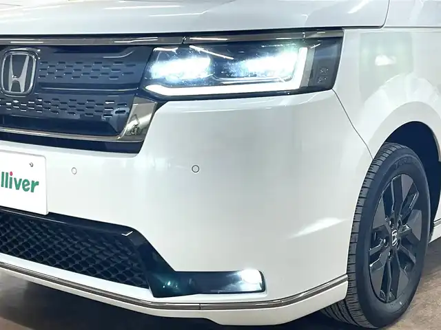 ホンダ ステップワゴン スパーダ 道央・札幌 2024(令6)年 2.4万km プラチナホワイトパール ・４WD/・社外メモリーナビ（AVIC-RZ314）/・BT/USB/ipod/AUX/・ステアリングリモコン/・バックカメラ/・ドライブレコーダー/・ETC/・ホンダセンシング/・衝突被害軽減ブレーキ/・レーンキープアシスト/・レーダークルーズコントロール/・ブラインドスポットインフォメーション/・オートブレーキホールド/・アイドリングストップ/・コーナーセンサー/・パドルシフト/・両側パワースライドドア/・パワーバックドア/・オートマチックハイビーム/・オートライト/・ヘッドランプレベライザー/・LEDヘッドライト/・ハーフレザーシート/・D+N席シートヒーター/・純正１６インチAW/・純正フロアマット/・プッシュスタート/・スマートキー/・スペアキー（１本）/・取扱説明書/・保証書