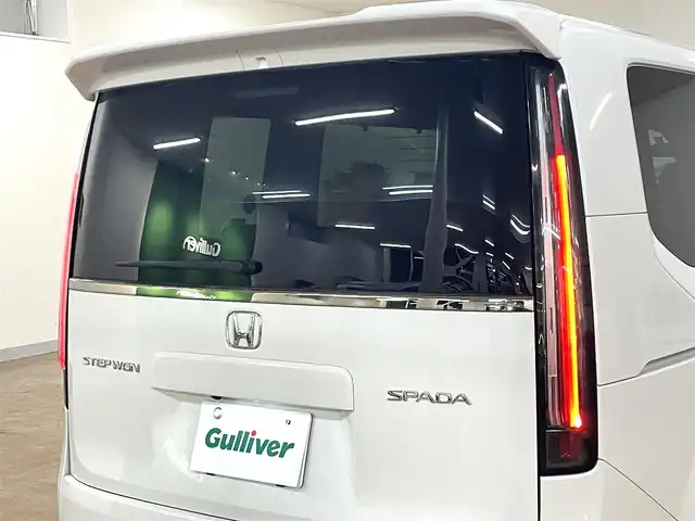 ホンダ ステップワゴン スパーダ 道央・札幌 2024(令6)年 2.4万km プラチナホワイトパール ・４WD/・社外メモリーナビ（AVIC-RZ314）/・BT/USB/ipod/AUX/・ステアリングリモコン/・バックカメラ/・ドライブレコーダー/・ETC/・ホンダセンシング/・衝突被害軽減ブレーキ/・レーンキープアシスト/・レーダークルーズコントロール/・ブラインドスポットインフォメーション/・オートブレーキホールド/・アイドリングストップ/・コーナーセンサー/・パドルシフト/・両側パワースライドドア/・パワーバックドア/・オートマチックハイビーム/・オートライト/・ヘッドランプレベライザー/・LEDヘッドライト/・ハーフレザーシート/・D+N席シートヒーター/・純正１６インチAW/・純正フロアマット/・プッシュスタート/・スマートキー/・スペアキー（１本）/・取扱説明書/・保証書