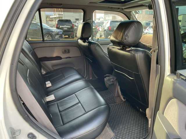 トヨタ ハイラックス サーフ SSR－X 長崎県 2001(平13)年 15.6万km ホワイト/シルバーM NALDIウッドステアリング/エンジンスターター/ミラー一体型バックカメラ/リフトアップ/マーテルギアアルミホイール/サンルーフ