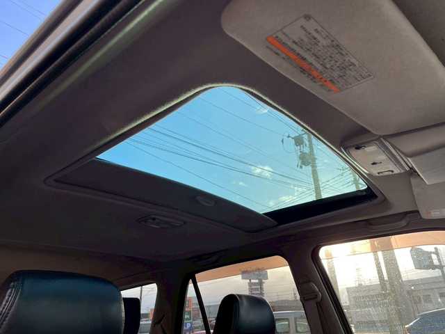 トヨタ ハイラックス サーフ SSR－X 長崎県 2001(平13)年 15.6万km ホワイト/シルバーM NALDIウッドステアリング/エンジンスターター/ミラー一体型バックカメラ/リフトアップ/マーテルギアアルミホイール/サンルーフ