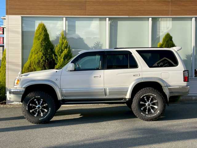 トヨタ ハイラックス サーフ SSR－X 長崎県 2001(平13)年 15.6万km ホワイト/シルバーM NALDIウッドステアリング/エンジンスターター/ミラー一体型バックカメラ/リフトアップ/マーテルギアアルミホイール/サンルーフ