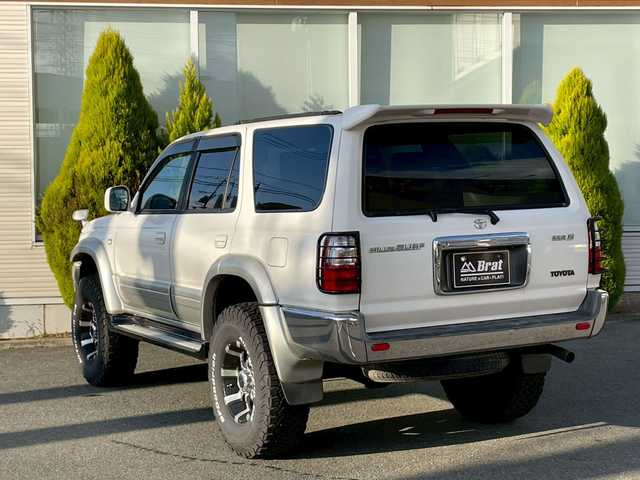 トヨタ ハイラックス サーフ SSR－X 長崎県 2001(平13)年 15.6万km ホワイト/シルバーM NALDIウッドステアリング/エンジンスターター/ミラー一体型バックカメラ/リフトアップ/マーテルギアアルミホイール/サンルーフ