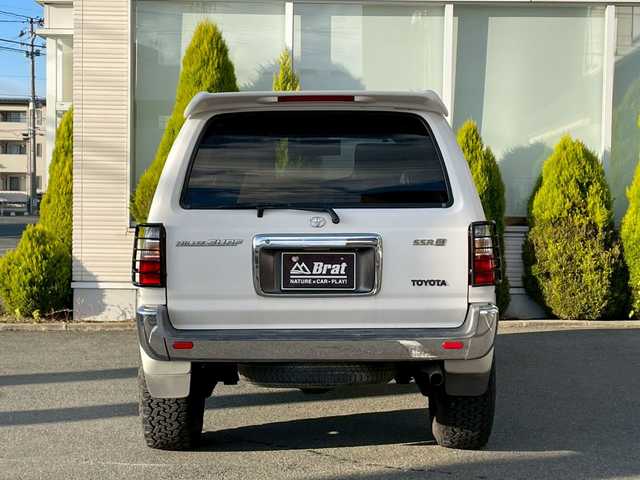 トヨタ ハイラックス サーフ SSR－X 長崎県 2001(平13)年 15.6万km ホワイト/シルバーM NALDIウッドステアリング/エンジンスターター/ミラー一体型バックカメラ/リフトアップ/マーテルギアアルミホイール/サンルーフ