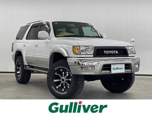 トヨタ ハイラックス サーフ SSR－X 長崎県 2001(平13)年 15.6万km ホワイト/シルバーM 社外メモリナビ/（フルセグ/CD/DVD/BT）/ミラー一体型バックカメラ/サンルーフ/リフトアップ/NALDIウッドステアリング（純正ハンドル有り）/マーテルギア16インチアルミホイール/ドライブレコーダー前後/ETC/レーダー探知機/社外フロアマット/黒革調シートカバー/ハロゲンヘッドライト/ドアバイザー/電動格納ミラー/パワーステアリング/パワーウィンドウ/エンジンスターター/スペアキー/保証書/取扱説明書