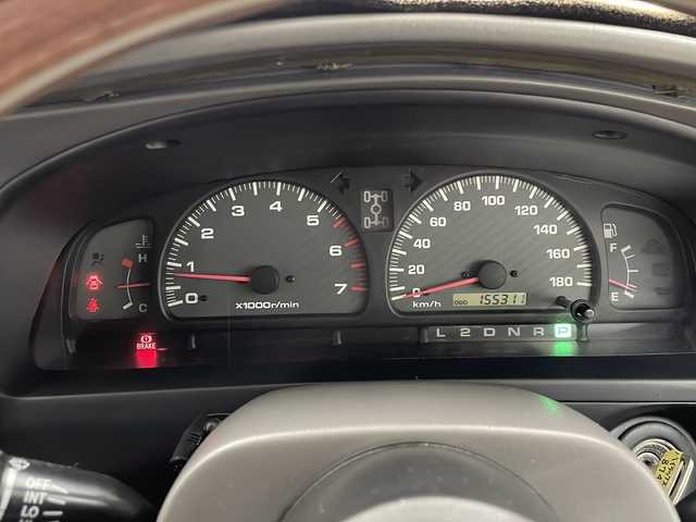 トヨタ ハイラックス サーフ SSR－X 長崎県 2001(平13)年 15.6万km ホワイト/シルバーM 社外メモリナビ/（フルセグ/CD/DVD/BT）/ミラー一体型バックカメラ/サンルーフ/リフトアップ/NALDIウッドステアリング（純正ハンドル有り）/マーテルギア16インチアルミホイール/ドライブレコーダー前後/ETC/レーダー探知機/社外フロアマット/黒革調シートカバー/ハロゲンヘッドライト/ドアバイザー/電動格納ミラー/パワーステアリング/パワーウィンドウ/エンジンスターター/スペアキー/保証書/取扱説明書