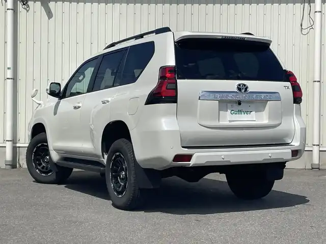 トヨタ ランドクルーザー プラド TX 山形県 2023(令5)年 1.9万km ホワイトパールクリスタルシャイン ディーゼル/４WD/セーフティセンス/ディスプレイオーディオ/　【CD DVD AUX USB BT】/バックカメラ/ドライブレコーダー/ETC/ステアリングスイッチ/レーダークルーズコントロール/革調シートカバー/横滑り防止装置/コーナーセンサー/LEDライト/フォグランプ/ウィンカーミラー/保証書、取説あり