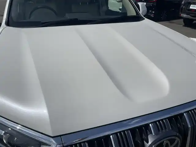 トヨタ ランドクルーザー プラド TX 山形県 2023(令5)年 1.9万km ホワイトパールクリスタルシャイン ディーゼル/４WD/セーフティセンス/ディスプレイオーディオ/　【CD DVD AUX USB BT】/バックカメラ/ドライブレコーダー/ETC/ステアリングスイッチ/レーダークルーズコントロール/革調シートカバー/横滑り防止装置/コーナーセンサー/LEDライト/フォグランプ/ウィンカーミラー/保証書、取説あり