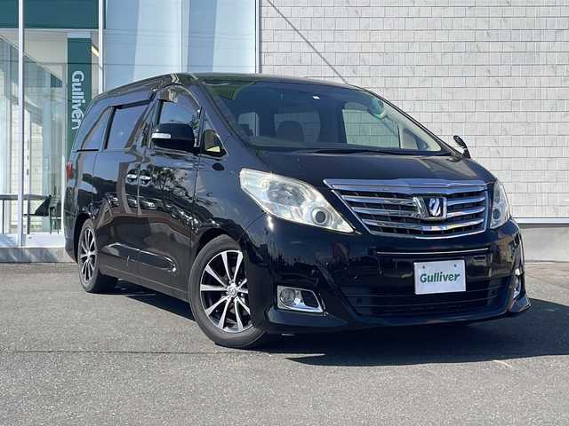 トヨタ アルファード 240G 岩手県 2012(平24)年 9.6万km ブラック 4WD/純正HDDナビ（CD/DVD//SD/ラジオ/Bluetooth）/純正フリップダウンモニター/フルセグテレビ /バックカメラ/両側パワースライドドア/パワーバックドア/クルーズコントロール/ビルトインETC/前席パワーシート/助手席/2列目オットマン/ステアリングスイッチ/スマートキー/プッシュスタート/コーナーセンサー/横滑り防止機能/HIDヘッドライト/オートライト/フォグランプ/電動格納ミラー/ウィンカーミラー/ドアバイザー/取説＆保証書