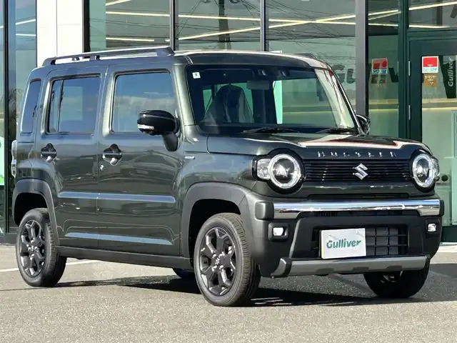 スズキ ハスラー タフワイルド 鹿児島県 2024(令6)年 0.1千km クールカーキPM 純正ナビ/(フルセグTV/Bluetooth/AppleCarPlay/AndroidAuto)/デュアルカメラブレーキサポート/誤発進抑制装置/車線逸脱警報/アダプティブクルーズコントロール/全方位カメラ/LEDヘッドライト/シートヒーター/純正15インチアルミホイール/ルーフレール/スマートキー