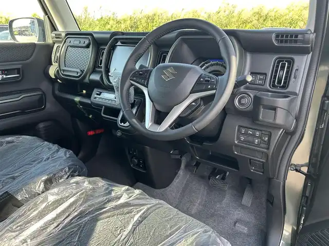 スズキ ハスラー タフワイルド 鹿児島県 2024(令6)年 0.1千km クールカーキPM 純正ナビ/(フルセグTV/Bluetooth/AppleCarPlay/AndroidAuto)/デュアルカメラブレーキサポート/誤発進抑制装置/車線逸脱警報/アダプティブクルーズコントロール/全方位カメラ/LEDヘッドライト/シートヒーター/純正15インチアルミホイール/ルーフレール/スマートキー