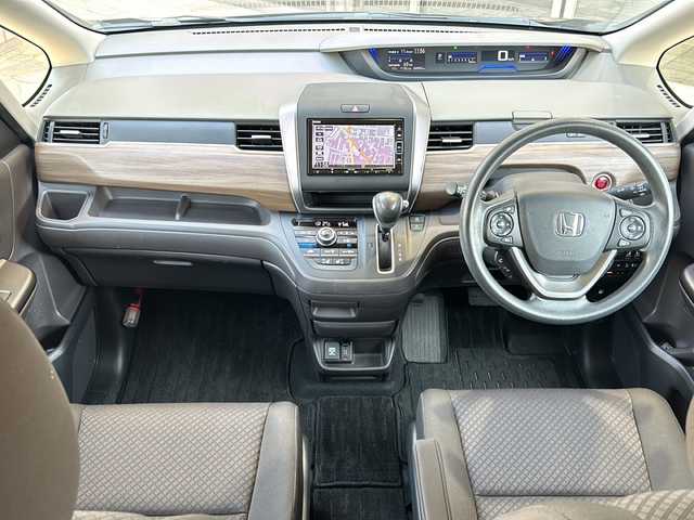 ホンダ フリード G ホンダセンシング 静岡県 2019(令1)年 4.1万km ミッドナイトブルービームM 純正ナビ  /（Bluetooth／CD／DVD／USB／フルセグTV）/バックカメラ  /両側電動スライドドア  /レーダークルーズコントロール/前席シートヒーター  /レーンキープアシスト  /後方ソナー  /衝突軽減ブレーキ  /アイドリングストップ  /3列シート  /盗難防止装置  /LEDヘッドライト  /オートライト  /プッシュスタート  /スマートキー
