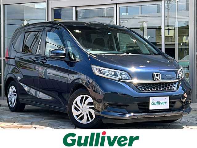 ホンダ フリード G ホンダセンシング 静岡県 2019(令1)年 4.1万km ミッドナイトブルービームM 純正ナビ  /（Bluetooth／CD／DVD／USB／フルセグTV）/バックカメラ  /両側電動スライドドア  /レーダークルーズコントロール/前席シートヒーター  /レーンキープアシスト  /後方ソナー  /衝突軽減ブレーキ  /アイドリングストップ  /3列シート  /盗難防止装置  /LEDヘッドライト  /オートライト  /プッシュスタート  /スマートキー