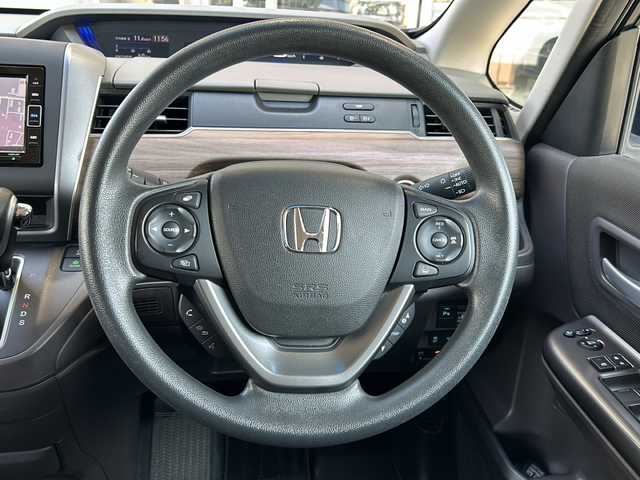 ホンダ フリード G ホンダセンシング 静岡県 2019(令1)年 4.1万km ミッドナイトブルービームM 純正ナビ  /（Bluetooth／CD／DVD／USB／フルセグTV）/バックカメラ  /両側電動スライドドア  /レーダークルーズコントロール/前席シートヒーター  /レーンキープアシスト  /後方ソナー  /衝突軽減ブレーキ  /アイドリングストップ  /3列シート  /盗難防止装置  /LEDヘッドライト  /オートライト  /プッシュスタート  /スマートキー