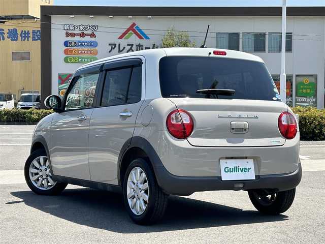 スズキ ラパン X 愛媛県 2016(平28)年 6.8万km フォーンベージュメタリック/ホワイト2トーンルーフ 禁煙車/登録時走行距離：67513km/メーカーオプション純正ナビ/CD/DVD/フルセグTV/Bluetooth/AUX/全方位カメラ/バックカメラ/衝突被害軽減システム/横滑り防止装置/アイドリングストップ/HIDヘッドライト/オートライト/運転席シートヒーター/エンジンスタートボタン/スマートキー/純正フロアマット/純正14インチアルミホイール