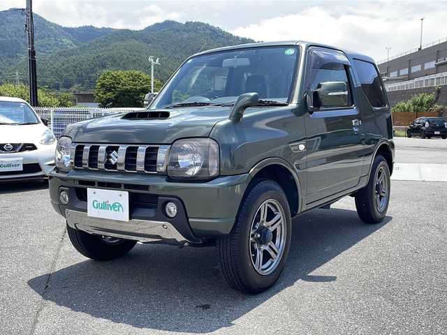 スズキ ジムニー ランドベンチャー 山梨県 2014(平26)年 5.3万km クールカーキPM 社外ＳＤナビ　/社外ＥＴＣ　/フルセグＴＶ　/ＣＤ　/Ｂｌｕｅｔｏｏｔｈ　/ドラレコ　/純正フロアマット　/レザーシート　/運転席シートヒーター　/背面タイヤ　/純正１６インチＡＷ　/ＡＢＳ　/ＨＩＤヘッドライト　/パワステ