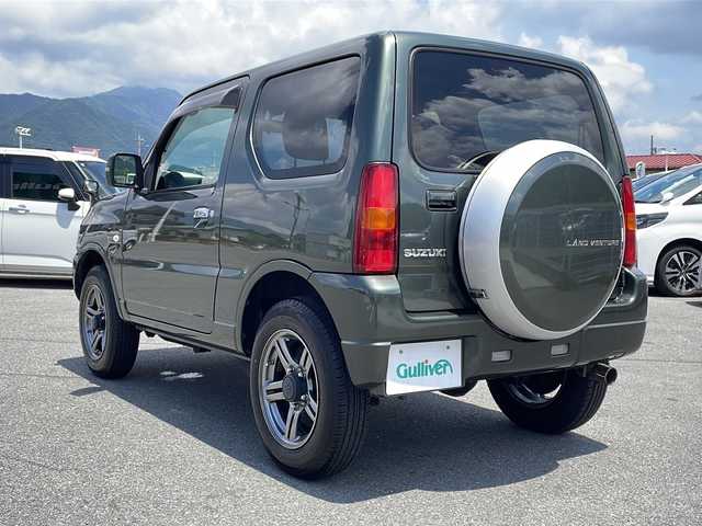 スズキ ジムニー ランドベンチャー 山梨県 2014(平26)年 5.3万km クールカーキPM 社外ＳＤナビ　/社外ＥＴＣ　/フルセグＴＶ　/ＣＤ　/Ｂｌｕｅｔｏｏｔｈ　/ドラレコ　/純正フロアマット　/レザーシート　/運転席シートヒーター　/背面タイヤ　/純正１６インチＡＷ　/ＡＢＳ　/ＨＩＤヘッドライト　/パワステ