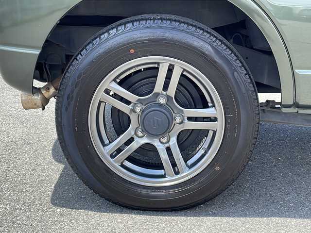 スズキ ジムニー ランドベンチャー 山梨県 2014(平26)年 5.3万km クールカーキPM 社外ＳＤナビ　/社外ＥＴＣ　/フルセグＴＶ　/ＣＤ　/Ｂｌｕｅｔｏｏｔｈ　/ドラレコ　/純正フロアマット　/レザーシート　/運転席シートヒーター　/背面タイヤ　/純正１６インチＡＷ　/ＡＢＳ　/ＨＩＤヘッドライト　/パワステ
