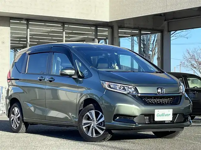 ホンダ フリード＋ G ホンダセンシング 宮城県 2021(令3)年 1.2万km シルバーミストグリーンM ワンオーナー/純正ナビ/ＨｏｎｄａＳＥＮＳＩＮＧ/ＣＤ／ＤＶＤ／ＦＭ／ＡＭ／Ｂｌｕｅｔｏｏｔｈ／ＵＳＢ/レーンキープアシスト/横滑り防止装置/プリクラッシュセーフティ/クルーズコントロール/アイドリングストップ/前席シートヒーター/オートライト(LED)/後席サンシェード有/ＥＴＣ/社外ドライブレコーダー前後/純正フロアマット/両側パワースライドドア