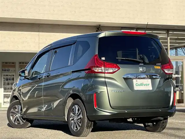 ホンダ フリード＋ G ホンダセンシング 宮城県 2021(令3)年 1.2万km シルバーミストグリーンM ワンオーナー/純正ナビ/ＨｏｎｄａＳＥＮＳＩＮＧ/ＣＤ／ＤＶＤ／ＦＭ／ＡＭ／Ｂｌｕｅｔｏｏｔｈ／ＵＳＢ/レーンキープアシスト/横滑り防止装置/プリクラッシュセーフティ/クルーズコントロール/アイドリングストップ/前席シートヒーター/オートライト(LED)/後席サンシェード有/ＥＴＣ/社外ドライブレコーダー前後/純正フロアマット/両側パワースライドドア