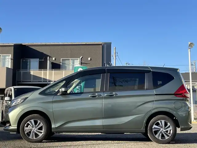 ホンダ フリード＋ G ホンダセンシング 宮城県 2021(令3)年 1.2万km シルバーミストグリーンM ワンオーナー/純正ナビ/ＨｏｎｄａＳＥＮＳＩＮＧ/ＣＤ／ＤＶＤ／ＦＭ／ＡＭ／Ｂｌｕｅｔｏｏｔｈ／ＵＳＢ/レーンキープアシスト/横滑り防止装置/プリクラッシュセーフティ/クルーズコントロール/アイドリングストップ/前席シートヒーター/オートライト(LED)/後席サンシェード有/ＥＴＣ/社外ドライブレコーダー前後/純正フロアマット/両側パワースライドドア