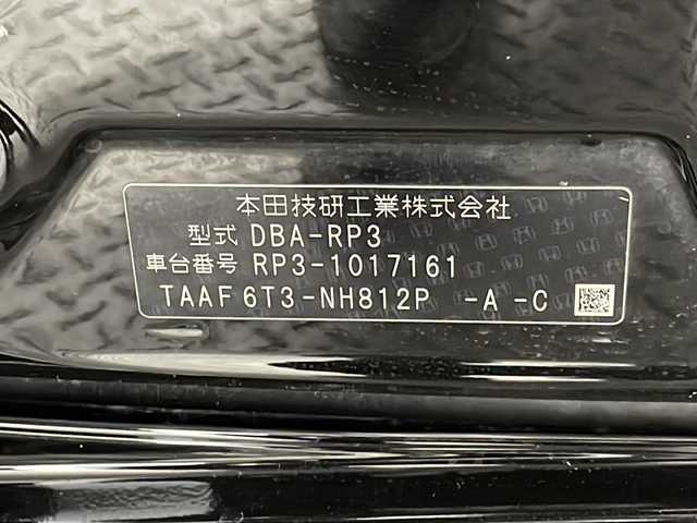 ホンダ ステップワゴン スパーダ 沖縄県 2015(平27)年 10.1万km プレミアムスパークルブラックパール 禁煙車/７人乗り/純正７インチナビ/【CD/DVD/フルセグTV/BT】/バックカメラ/９インチ純正後席フリップダウンモニター/前後ドライブレコーダー/ETC/クルーズコントロール/両側パワースライドドア/横滑り防止装置/全席革調シートカバー/LEDヘッドライト/オートライト/１６インチ純正アルミ/スマートキー