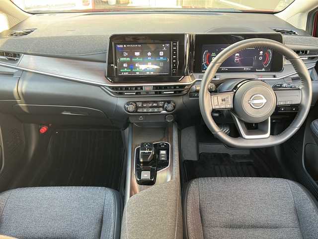 日産 オーラ G FOUR 広島県 2023(令5)年 0.4万km ガーネットレッド/スーパーブラック 2トーン 禁煙車/4WD/エマージェンシーブレーキ/車線逸脱警報/ハイビームアシスト/道路標識認識/速度標識認識/先行車発進お知らせ/コーナーセンサー/純正9型ナビ（MM223D-Le）/・フルセグTV/Bluetooth/SD/HDMI/アラウンドビューモニター/インテリジェントルームミラー/ステアリングヒーター/ハーフレザーシート/シートヒーター/オートライト/LEDヘッドライト/フォグランプ/純正ドライブレコーダー（前）/ETC/純正ドアバイザー/純正17インチアルミホイール/W+サイド+カーテンエアバック