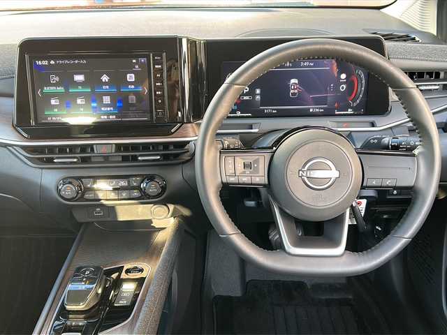 日産 オーラ G FOUR 広島県 2023(令5)年 0.4万km ガーネットレッド/スーパーブラック 2トーン 禁煙車/4WD/エマージェンシーブレーキ/車線逸脱警報/ハイビームアシスト/道路標識認識/速度標識認識/先行車発進お知らせ/コーナーセンサー/純正9型ナビ（MM223D-Le）/・フルセグTV/Bluetooth/SD/HDMI/アラウンドビューモニター/インテリジェントルームミラー/ステアリングヒーター/ハーフレザーシート/シートヒーター/オートライト/LEDヘッドライト/フォグランプ/純正ドライブレコーダー（前）/ETC/純正ドアバイザー/純正17インチアルミホイール/W+サイド+カーテンエアバック