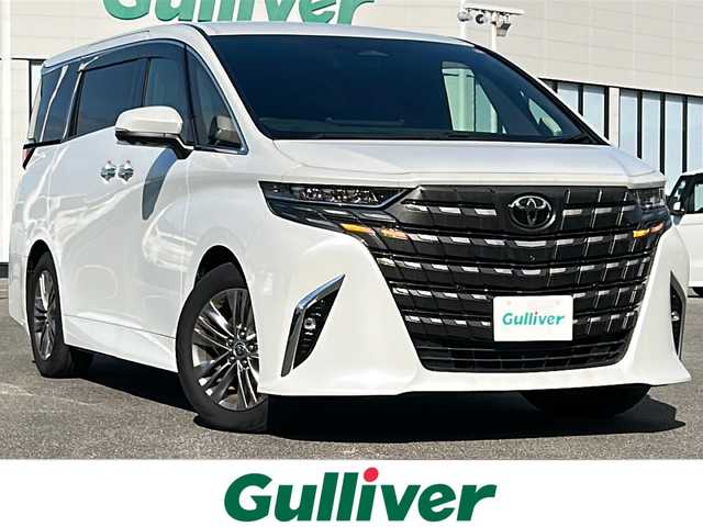 トヨタ アルファードハイブリット Z 佐賀県 2024(令6)年 1.3万km プラチナホワイトパールマイカ 左右独立ムーンルーフ/純正14インチディスプレイオーディオ(ナビ機能/HDMI/CarPlay/Bluetooth/フルセグ)/純正13.2インチリアエンターテイメント/両側パワースライドドア/全方位カメラ/デジタルインナーミラー/前後ドライブレコーダー/ビルトインETC2.0/ユニバーサルステップ/アドバンスドパーク/アドバンストドライブ/トヨタセーフティセンス/クリアランスソナー/BSM/ヘッドアップディスプレイ/電動リアゲート/スーパーロングオーバーヘッドコンソール/置くだけ充電/合皮シート/D/N席パワーシート・シートヒーター・エアーシート/純正18インチアルミホイール/純正フロアマット