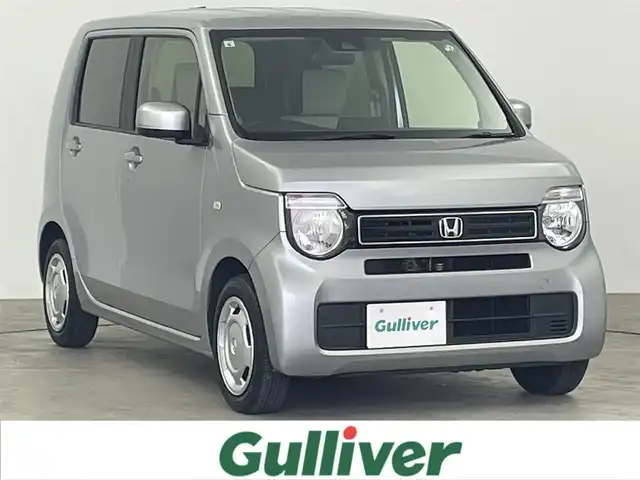 ホンダ Ｎ ＷＧＮ L ホンダセンシング 大分県 2021(令3)年 0.5万km ルナシルバーM ワンオーナー/ホンダセンシング/・衝突被害軽減ブレーキ/・レーンキープアシスト/・レーダークルーズコントロール/・先行車発進お知らせ機能/純正ディスプレイオーディオ/（CD/Bluetooth/AM/FM）/・ETC/電子パーキング/オートホールド/シートヒーター(運転席)/プッシュスタート/スマートキー/スペアキー/純正フロアマット/保証書/取扱説明書