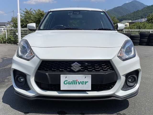 スズキ スイフト スポーツ セーフティPKG 山梨県 2019(令1)年 8.7万km ピュアホワイトP ６MT/純正ＳＤナビ　/全方位モニター　/純正ビルトインＥＴＣ　/ワンセグＴＶ　/Ｂｌｕｅｔｏｏｔｈ　/ＣＤ　/ＵＳＢ　/ドライブレコーダー/クルーズコントロール/運転席シートヒーター　/純正１７インチＡＷ　/ＡＢＳ　/横滑り防止装置　/レーンキープアシスト　/オートライト/プッシュスタート/純正フロアマット