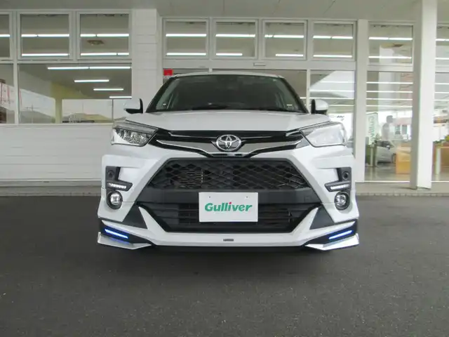 トヨタ ライズ Z 千葉県 2020(令2)年 2.7万km シャイニングホワイトパール ワンオーナー/保証書/取説/社外前後ドライブレコーダー/スマートアシストIII/レーダークルーズコントロール/BSM/RCTA/モデリスタフルエアロキット/モデリスタフロントグリルカバー/モデリスタマフラーカッター/純正９インチSDナビフルセグTV/CD/DVD/SD/SDREC/Bluetooth/全方位パノラミックビューカメラ/前席ヒートシーター/TVキャンセラー/ USB/LEDヘッドライト/LEDフォグランプ/LEDビームライト/ バックフォグランプ/ステアリングリモコン付き革巻きステアリング/シーケンシャルウインカー/D席シートリフト/OPインチUP17インチAW/OPスペアタイヤ/ビルトイン2.0ETC