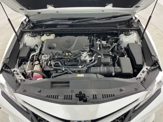 トヨタ カムリ WSレザーパッケージ 愛知県 2019(令1)年 4.9万km プラチナホワイトパールマイカ 禁煙車/ワンオーナー/純正8インチナビ/（CD/DVD/Bluetooth/フルセグTV/USB)/バックカメラ/トヨタセーフティセンス/・プリクラッシュセーフティ/・レーダークルーズコントロール/・レーントレーシングアシスト/・オートマチックハイビーム/・ロードサインアシスト/・ブラインドスポットモニター/・パーキングサポートブレーキ/・パーキングサポートブレーキ/ヘッドアップディスプレイ/ETC/前後ドライブレコーダー/レザーシート/シートヒーター/パワーシート/パドルシフト/純正18インチアルミホイール/スマートキー/スペアキー1本/プッシュスタート/LEDヘッドライト/フロントフォグランプ/オートライト/純正フロアマット/横滑り防止装置/電子パーキングブレーキ/オートホールド
