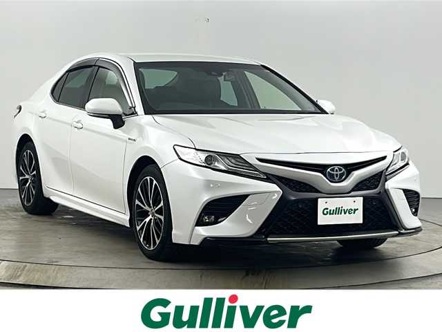 トヨタ カムリ WSレザーパッケージ 愛知県 2019(令1)年 4.9万km プラチナホワイトパールマイカ 禁煙車/ワンオーナー/純正8インチナビ/（CD/DVD/Bluetooth/フルセグTV/USB)/バックカメラ/トヨタセーフティセンス/・プリクラッシュセーフティ/・レーダークルーズコントロール/・レーントレーシングアシスト/・オートマチックハイビーム/・ロードサインアシスト/・ブラインドスポットモニター/・パーキングサポートブレーキ/・パーキングサポートブレーキ/ヘッドアップディスプレイ/ETC/前後ドライブレコーダー/レザーシート/シートヒーター/パワーシート/パドルシフト/純正18インチアルミホイール/スマートキー/スペアキー1本/プッシュスタート/LEDヘッドライト/フロントフォグランプ/オートライト/純正フロアマット/横滑り防止装置/電子パーキングブレーキ/オートホールド