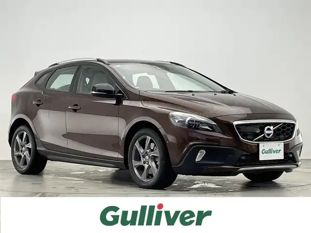 ボルボ Ｖ４０ クロスカントリー D4 SE 滋賀県 2015(平27)年 5.5万km 茶 禁煙車/純正ナビ/（CD/DVD/BT/フルセグTV)/バックカメラ/ETC/白レザーシート/前席シートヒーター/前席パワーシート/パーキングアシスト/BSM/HIDヘッドライト/オートライト/前後ソナー/アダプティブクルーズコントロール/衝突被害軽減ブレーキ/レーンキープアシスト/アイドリングストップ/パドルシフト/リモコンキー×２