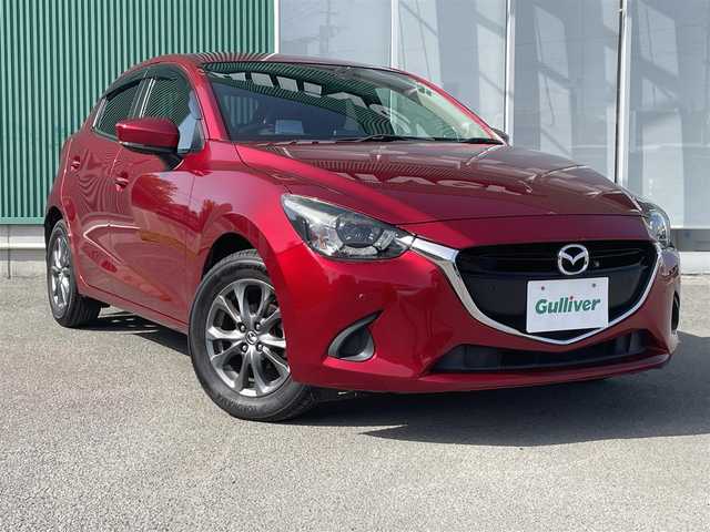 マツダ デミオ 13S ツーリング 福岡県 2018(平30)年 3.8万km ソウルレッドクリスタルM ・アラウンドビューモニター/・12V120M付きソケット/・シートヒーター（ドライバー席助手席）/・CD入れる箇所あり/・SPORTモード/・PUSHスタート/・パワーステアリング/・パワーウインドウ/・MTモード付AT/・アイトングストップ/・過給機有/・AAC/・BT/・USB入力端子2つ/・ETC（社外）/・ミュージックサーバー（SD）/・フルセグTV/・ベンチシート/・純正フロアマット/・純正アルミホイール/・ABS/・横滑り防止装置/・前後コーナーセンサー/・レーンキープアシスト/・オートライト/・W+サイド、カーテンエアバッグ/・衝突被害軽減時ステム/レーンキープアシスト、木トライト、W＋サイドカーテンエアバグ、衝突被害軽減ステム