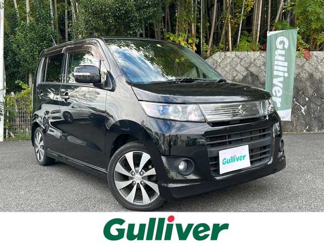 スズキ ワゴンＲ スティングレー T 京都府 2010(平22)年 10.4万km ブルーイッシュブラックパール3 社外SDナビ（CN-E310D）/・CD/FM/AM/Bluetooth/・ワンセグテレビ/ETC/革巻きステアリング/ステアリングリモコン/パドルシフト/シートヒーター（D席）/HIDヘッドライト/スマートキー/プッシュスタートボタン/12V電源/純正15インチアルミホイール/純正フロアマット/取扱説明書/保証書