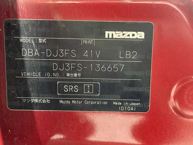 マツダ デミオ 13S 沖縄県 2015(平27)年 14.1万km ソウルレッドプレミアムメタリック 「禁煙車/ワンオーナー/純正ディスプレイオーディオ/Ｂｌｕｅｔｏｏｔｈ/バックカメラ/ＬＥＤヘッドライト/アイドリングストップ/オートライト/電動格納ミラー/横滑り防止装置/スペアキー/取扱説明書/保証書