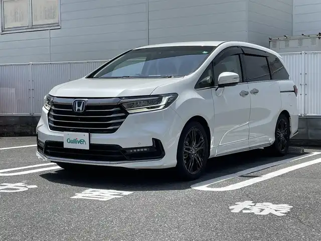 ホンダ オデッセイ ハイブリッド e:HEVアブソルート EX 群馬県 2021(令3)年 4万km プラチナホワイトパール ワンオーナー/純正SDナビ(AM・FM/BT/フルセグTV)/両側パワースライドドア/ビルトインETC2.0/追従クルーズコントロール/横滑り防止装置/車線逸脱防止アラート/ステアリングスイッチ/ステアリングヒーター/パワーシート(D/N席)/シートヒーター(D/N席)/オットマン/オートライト/LEDヘッドライト/電格ミラー/コーナーセンサー/プッシュスタート/スマートキー×2/取扱説明書/保証書/記録簿