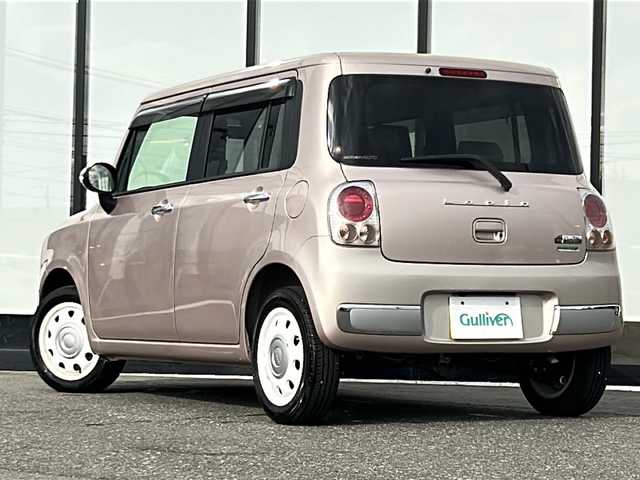 スズキ ラパン ショコラ X 山形県 2014(平26)年 5.9万km シャンパンピンクPM 4WD/SDナビ/ワンセグテレビ/バックカメラ/シートヒータ/オートライト/アイドリングストップ/電動格納ミラー/HID/ウィンカーミラー/ドアバイザー/プッシュスタート/スマートキー