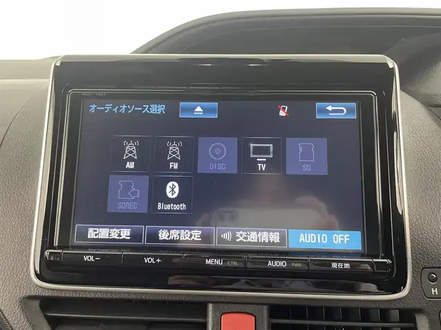 トヨタ ノア ハイブリッド Si ダブルバイビー 大分県 2018(平30)年 9.1万km ブラック 純正ナビ/（フルセグ/CD/DVD/Bluetooth）/フリップダウンモニター/プリクラッシュセーフティー/ハイビームアシスト/ビルトインETC/バックカメラ/両側パワースライドドア/ハーフレザーシート/シートヒーター/ステアリングスイッチ/純正アルミホイール/スマートキー・プッシュスタート/保証書
