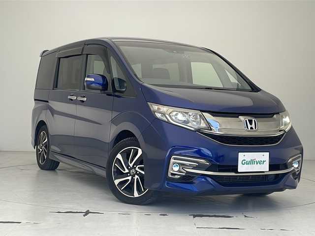 ホンダ ステップワゴン スパーダ クールスピリット 沖縄県 2015(平27)年 9.5万km コバルトブルーパール 純正ナビ　/フルセグＴＶ　/ＣＤ　/ＵＳＢ　/Ｂｌｕｅｔｏｏｔｈ　/ＥＴＣ　/バックカメラ　/純正フリップダウンモニター【VW155EN]　/前後ドライブレコーダー　【DVR-DD]/両側パワースライド　/シートヒーター　/横滑り防止装置　/盗難防止装置