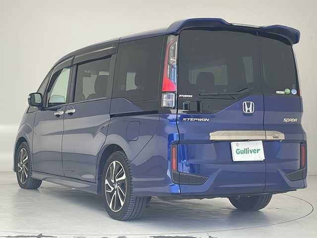ホンダ ステップワゴン スパーダ クールスピリット 沖縄県 2015(平27)年 9.5万km コバルトブルーパール 純正ナビ　/フルセグＴＶ　/ＣＤ　/ＵＳＢ　/Ｂｌｕｅｔｏｏｔｈ　/ＥＴＣ　/バックカメラ　/純正フリップダウンモニター【VW155EN]　/前後ドライブレコーダー　【DVR-DD]/両側パワースライド　/シートヒーター　/横滑り防止装置　/盗難防止装置
