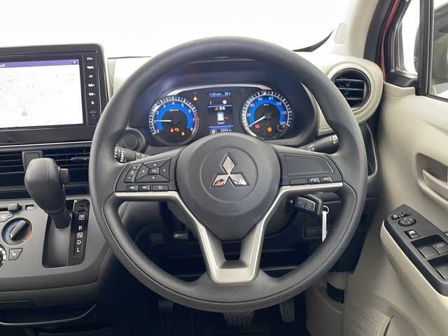 三菱 ｅＫワゴン M 愛知県 2023(令5)年 0.5万km コーラルピンクマイカ 衝突被害軽減ブレーキ/純正9インチディスプレイオーディオナビ（あり）/シートヒーター/ワンセグTV/Bluetooth/バックカメラ/コーナーセンサー/ステアリングスイッチ