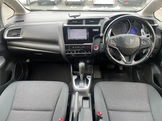 ホンダ フィット 13G Sパッケージ 埼玉県 2018(平30)年 8.7万km クリスタルブラックパール グレード：13G・S//ワンオーナー//純正メモリナビ//フルセグTV//バックカメラ//CD/DVD/Bluetooth//クルーズコントロール//ビルトインETC//スマートキー×2//LEDヘッドライト//LEDフォグ//パドルシフト//W.サイド.カーテンエアバッグ//ABS//横滑り防止装置//オートライト//プライバシーガラス//ドアバイザー//純正15インチAW//新車時保証書//取扱説明書//ナビ取説